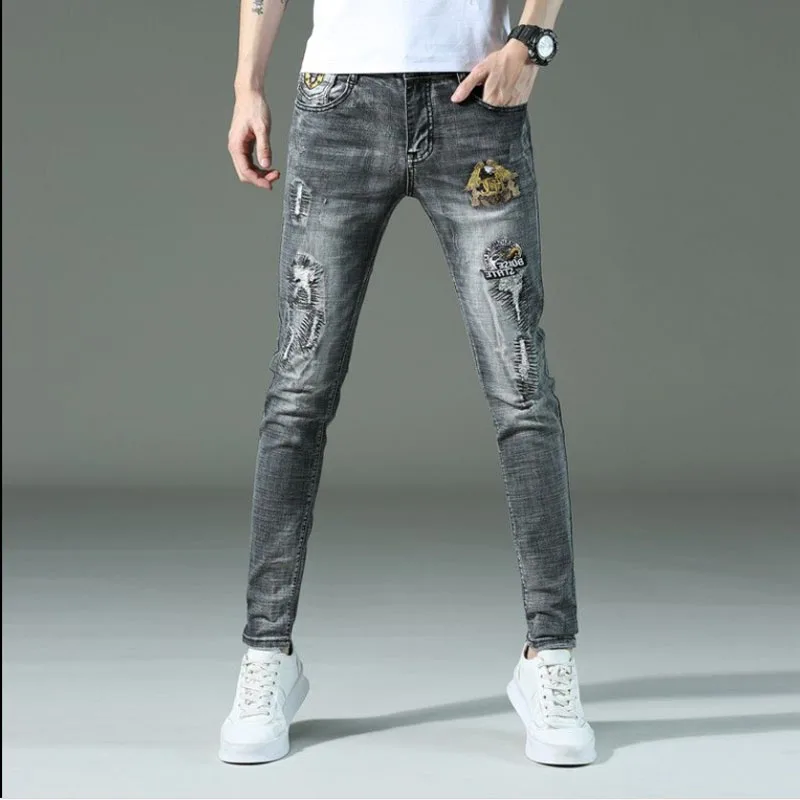 high quality Fashion trend hole sky blue embroidery badge jeans men's slim stretch feet pants men's summer trousers -ker