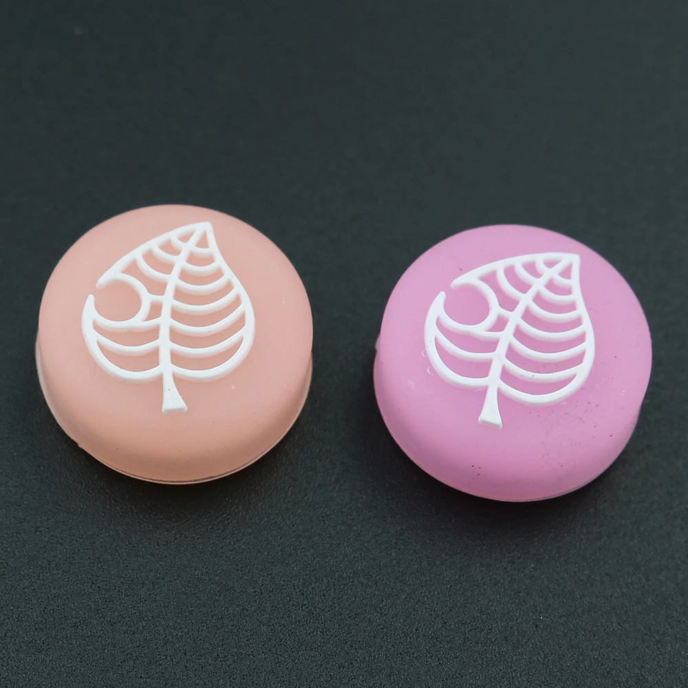 Joystick de silicona con forma de hoja luminosa para cruce de animales, tapas de agarre para pulgar de oso y hoja de árbol para controlador Nintendo Switch Lite