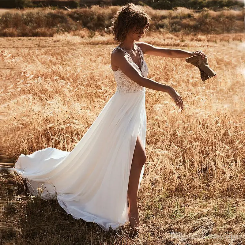 Abiti da sposa bohémien Sexy da spiaggia una linea scollo A V profondo Tulle Appliques pizzo Backless lunghezza del pavimento Boho abiti da sposa personalizzati economici