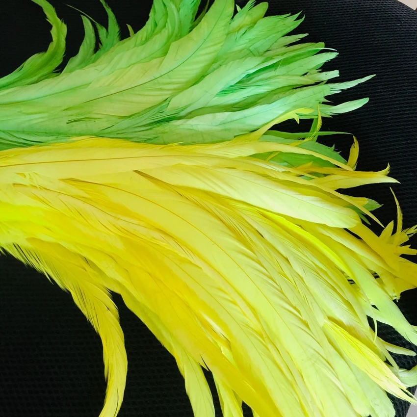 Moda 100 pz 25-30cm 10-12 pollici piume di coda di gallo fluorescente per la decorazione artigianato piuma matrimonio Cafts fai da te accessori