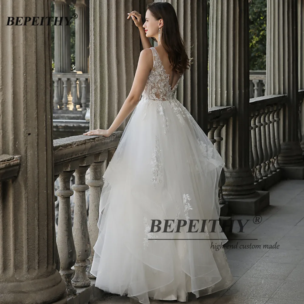 BEPEITHY Customized V Neck Ruffles Ivory Wedding Dress Sleeveless Lace Floor Length A Line Bride Chic Bridal Gown For Women 2023