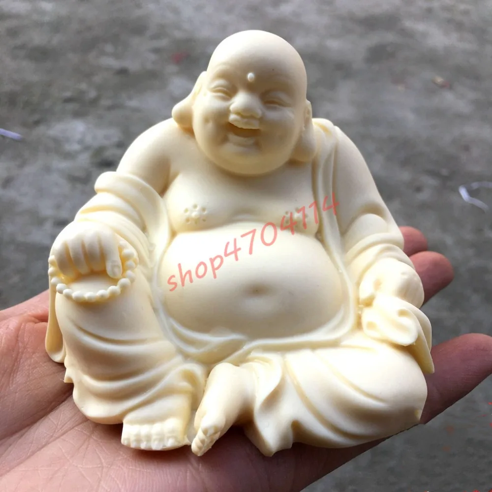 

Natural Ivory fruit, exquisite sculpture, Maitreya Buddha Decoration, exquisite handicrafts and decorations.