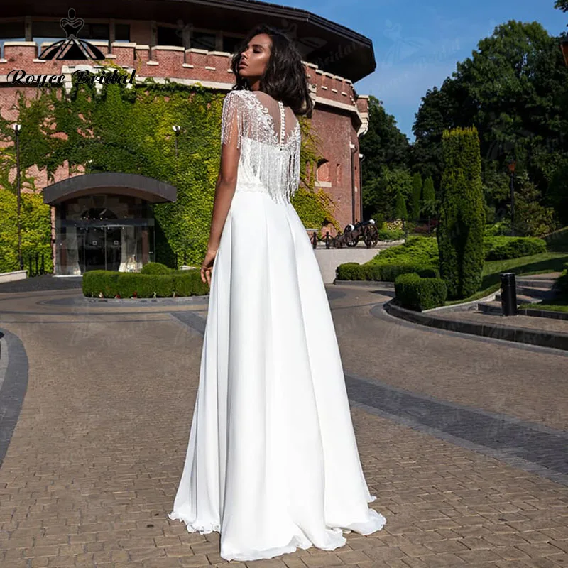 Vestido bohemio de encaje sin espalda para boda, prenda de playa elegante con cuello redondo, sin mangas, ilusión, longitud hasta el suelo, para fiesta de boda, 2022