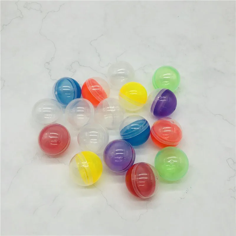 

100pcs 50mm Plastic Balls Half Colored half Transparent Plastic Capsules Vending Capsule for Toys Gift Packing Ball