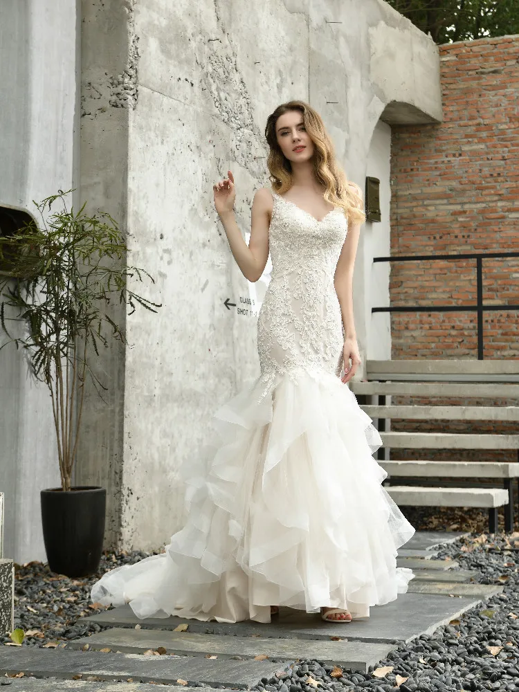 

Tiered Mermaid Wedding Dress Sleeveless illusion V-Neck lace Applique Beaded Bridal Gown