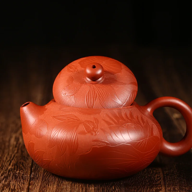 Yixing authentic ores are recommended by the pure hand-made tea home office kung fu tea pot lotus goldfish