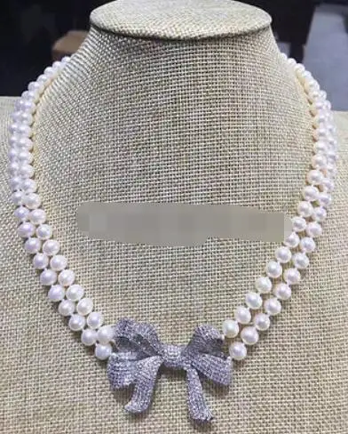 

P7526 - 2row 18-19" 8-9mm white round freshwater pearl necklace - zircon bowknot