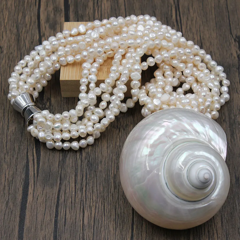 

GuaiGuai Jewelry 7 Strands Real Freshwater White Keshi Pearl Necklace Real White Mop Flash Shell Turbo sarmaticus Pendant