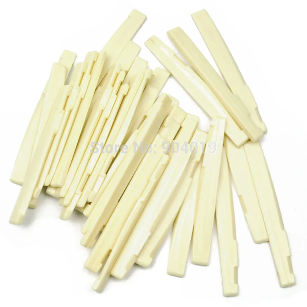 50pcs Universal Acoustic Guitar Bridge Lower Nut Saddles Plastic Ivory White