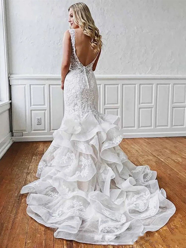 Rüschen Layered Rock Spitze Meerjungfrau Hochzeit Kleid Robe De Mariee Backless Tiefem V-ausschnitt Tiered Brautkleider 2019 Moderne Design