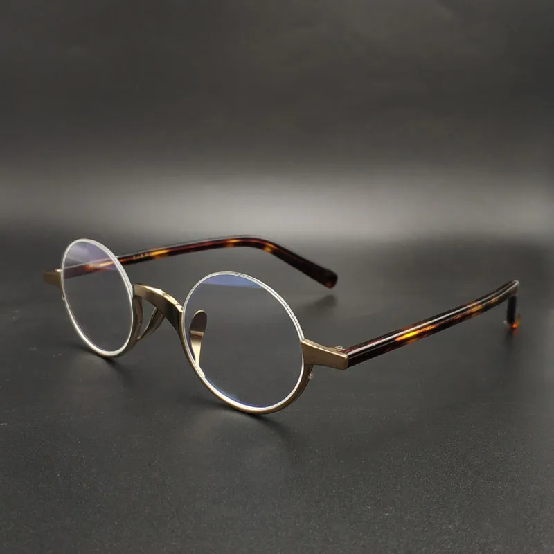 Gafas redondas pequeñas de metal de titanio para hombres y mujeres, montura óptica retro ovalada, montura inferior media, miopía, Vintage japonés