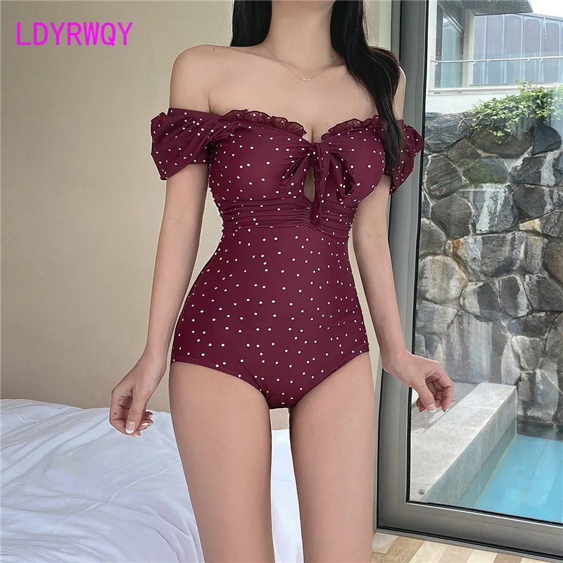 2021 new French style retro bubble sleeve sexy open back high waist conservative one piece swimsuit for women bikini