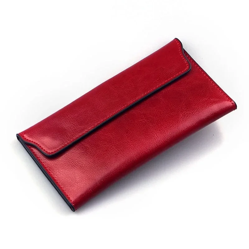 NIGEDU marka prawdziwej skóry kobiet portfel długa, cienka torebka skóra bydlęca etui na wiele kart Clutch bag moda standardowy portfel