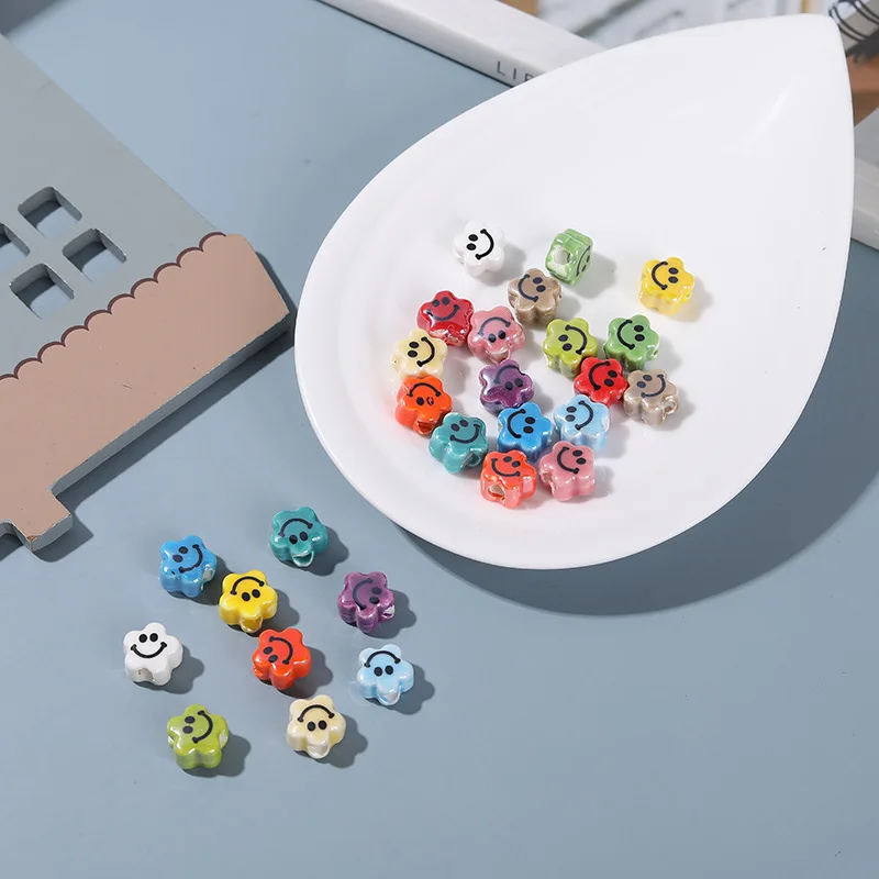 

10pcs 11x7mm Plum Blossom Smile Face Ceramic Beads Mix Color Vertical Hole Loose Spacer Bead For Jewelry Making DIY Bracelet