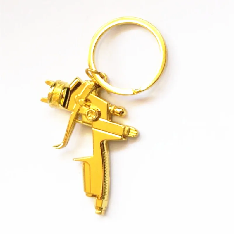 2024 new creative car paint spray gun model keychain charm fashion men and women car bag keychain accessories gift wholesale