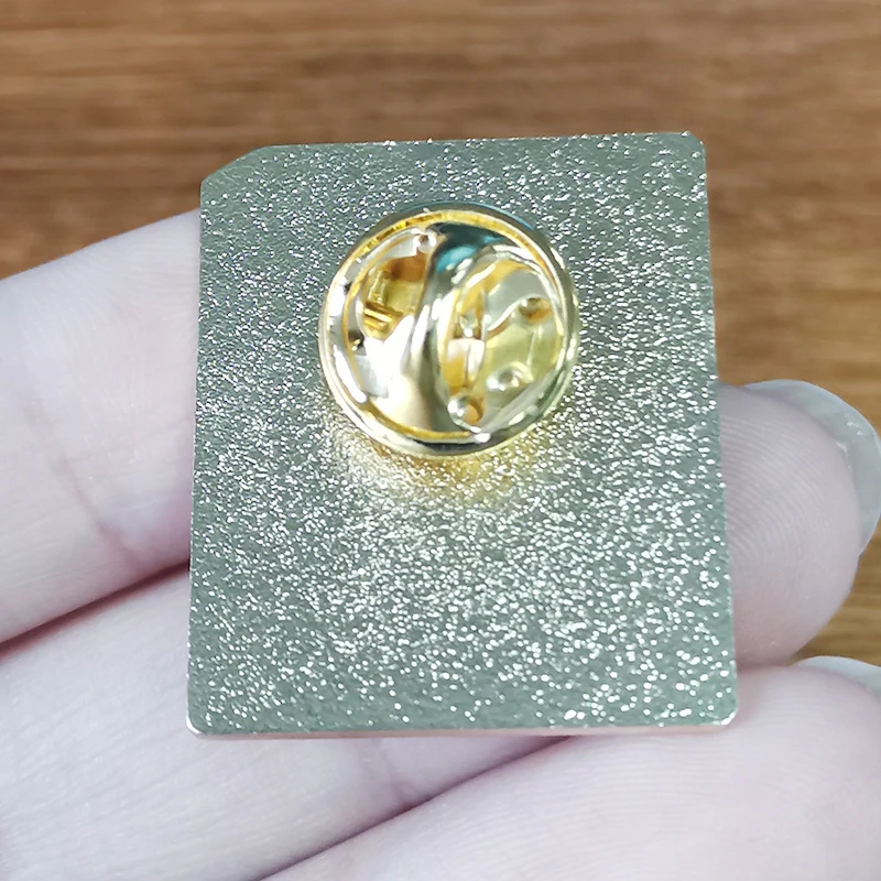 Spell book brooch