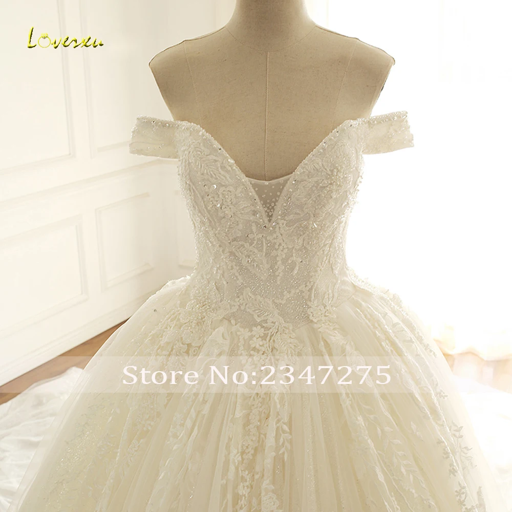 Loverxu-vestidos de novia de princesa con ilusión Sexy, apliques de lujo con cuentas de perlas, tren de corte, vestidos de novia Vintage, 2024