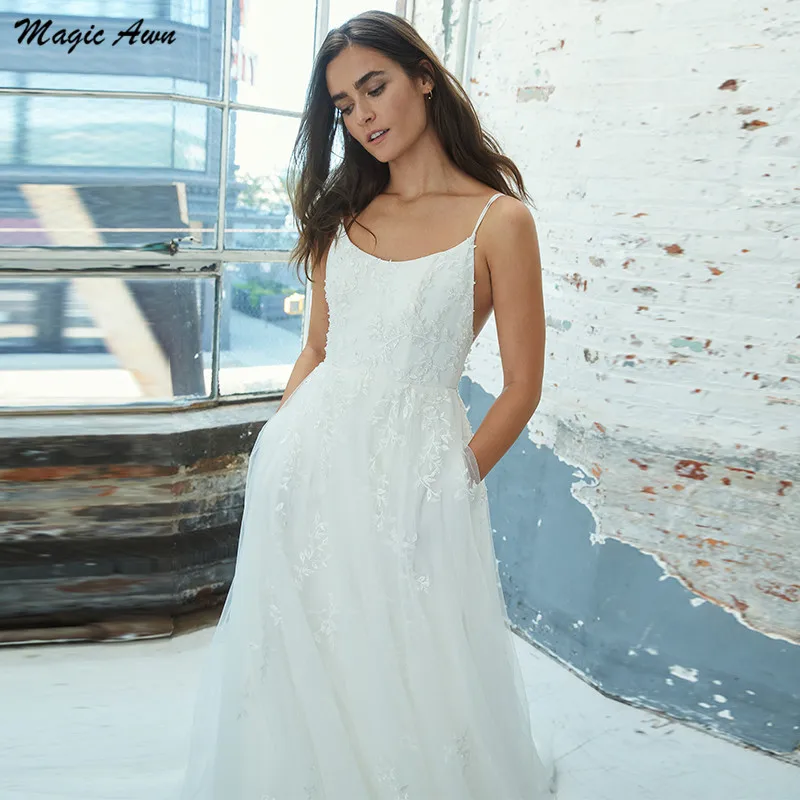 Mágica awn 2021 vestidos de casamento de tule, boho, rendas, apliques, alças espaguete, praia, vestido de casamento, bolsos traseiros abertos, linha a