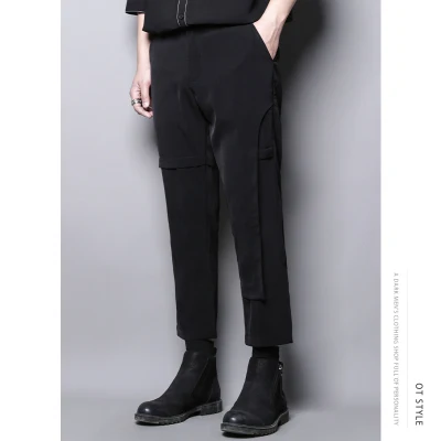 

Dark personality high-level design sense of asymmetric splicing false two casual pants nine-minute small pants men slim pants