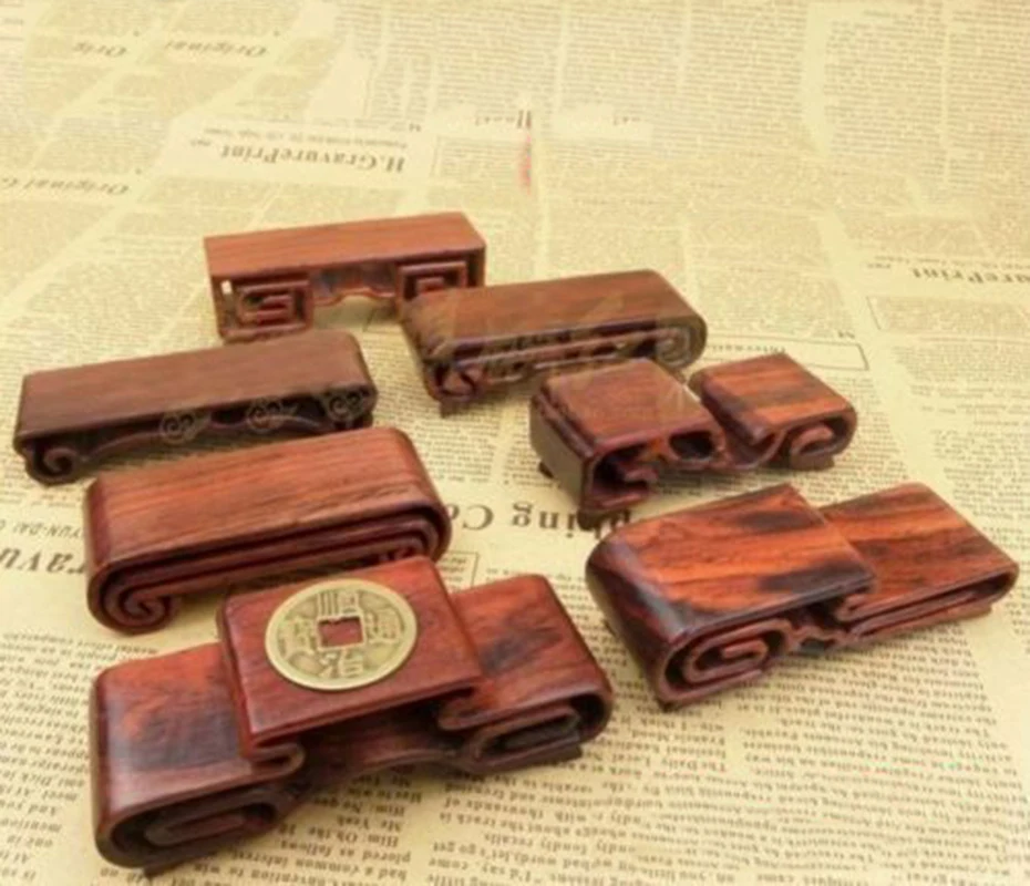 

Assorted 7 Pcs Small Red Suan Zhi Wood Stands for Netsuke Snuff Bottles