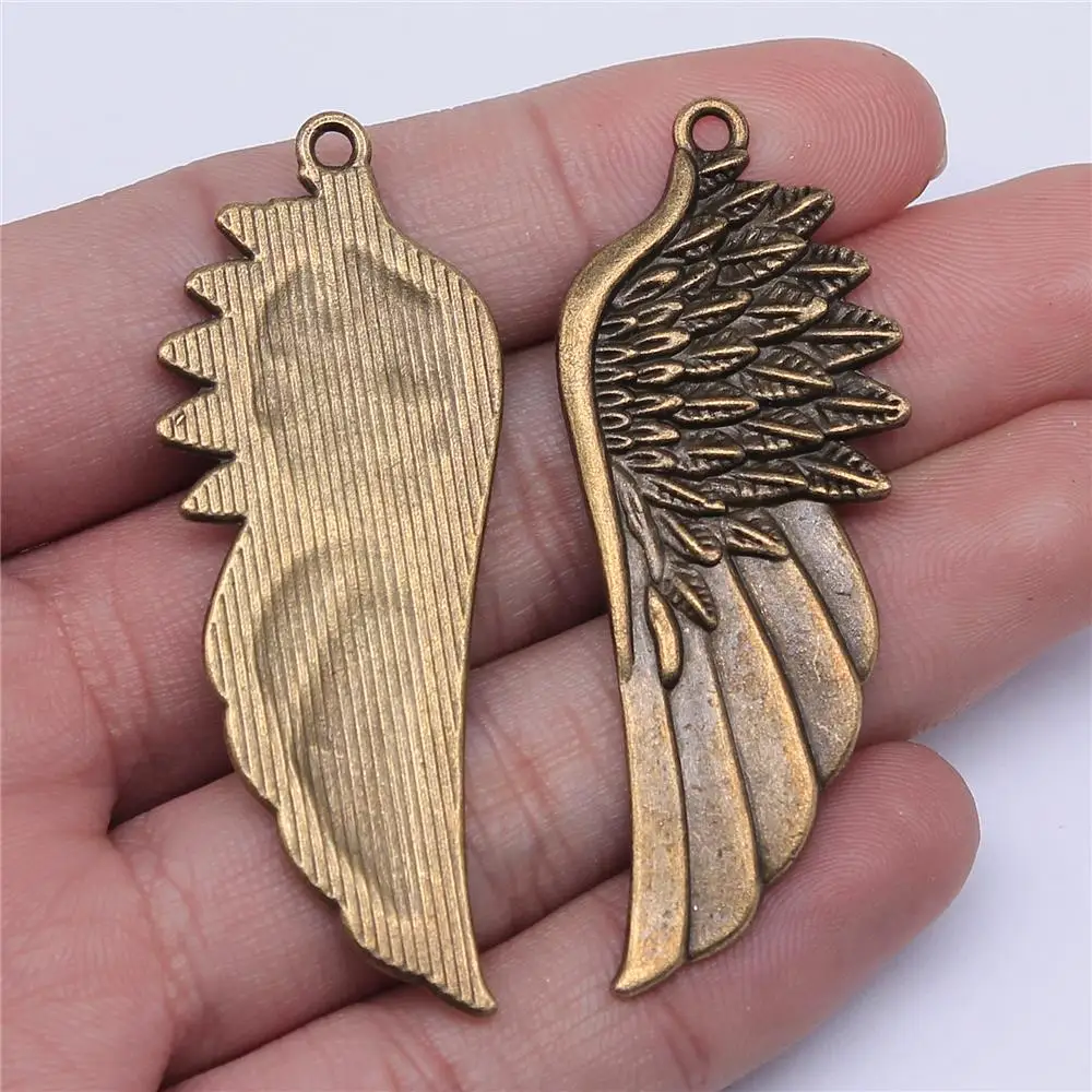 

Wholesale 50pcs/bag 58mm Big Angel Wing Charm Antique Bronze Color Charm Jewelry Findings For Jewelry Making