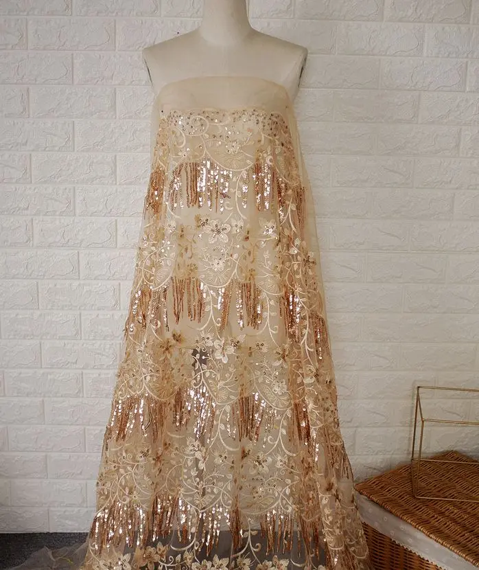 High-grade champagne gold mesh lace embroidery fabric Fringed sequins embroidered lace fabric Dress costume fabric