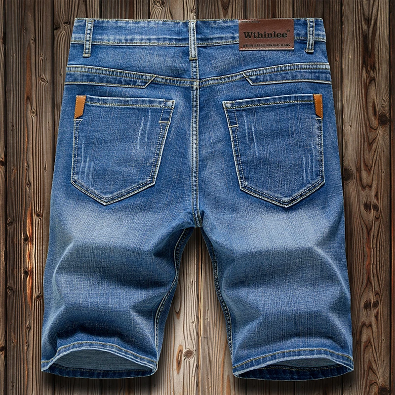 Pantalones cortos vaqueros ajustados para hombre, Jeans elásticos holgados que combinan con todo, pantalones de cinco puntos de marca de alta gama, moda informal de negocios, verano 2022