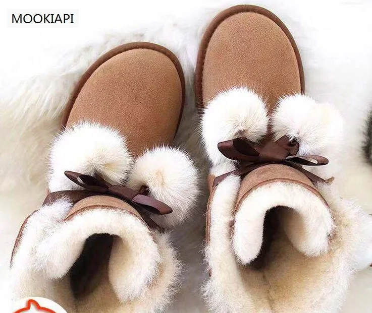 

The latest high-quality snow boots in Europe in 2019, women's shoes with wool balls, real sheepskin, natural wool, four colors