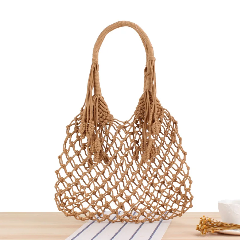 Ins Tassel Shoulder Woven Trendy Female Straw Beach Bag Degrees Handmade Cotton String Net Pocket Handbags Luxury Designer