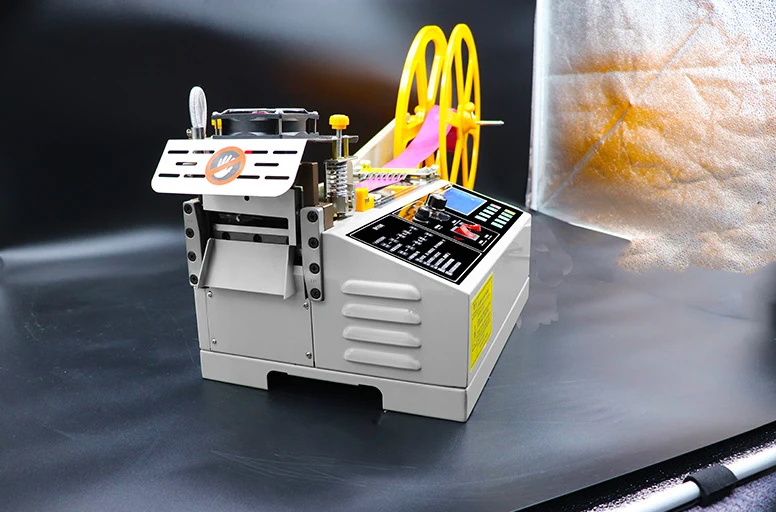 988T Automatic tape cutting machine by computer hot and cold cutting machine elastic tape cutting machine 110V / 220V 400W