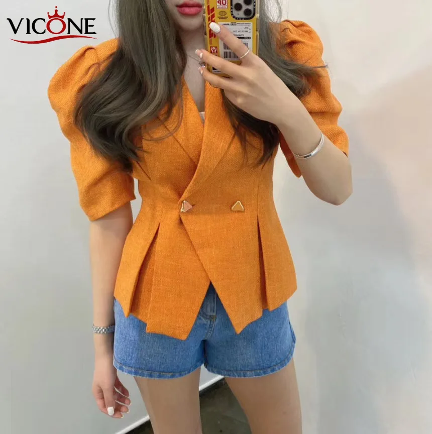 

VICONE spring new temperament hubble-bubble sleeve fold two grain of buckle waist breathable jacket