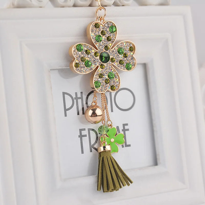 New crystal keychain rhinestone car leather tassel keychain female creative cute flower bag pendant four-leaf clover Keychain