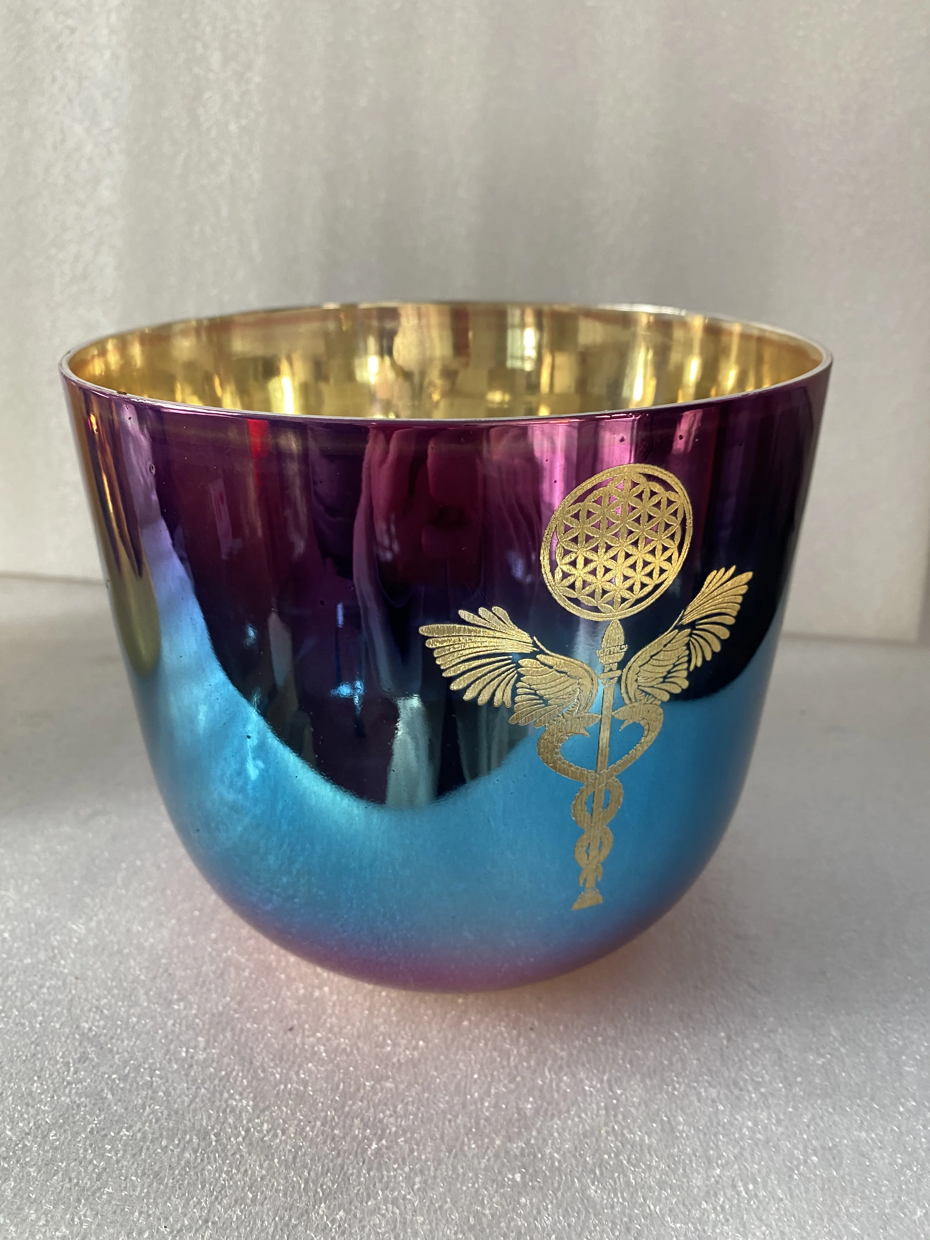 3rd octave B note crown chakra crystal singing bowl mixed shinny color with engraving flower of life for sound healing.