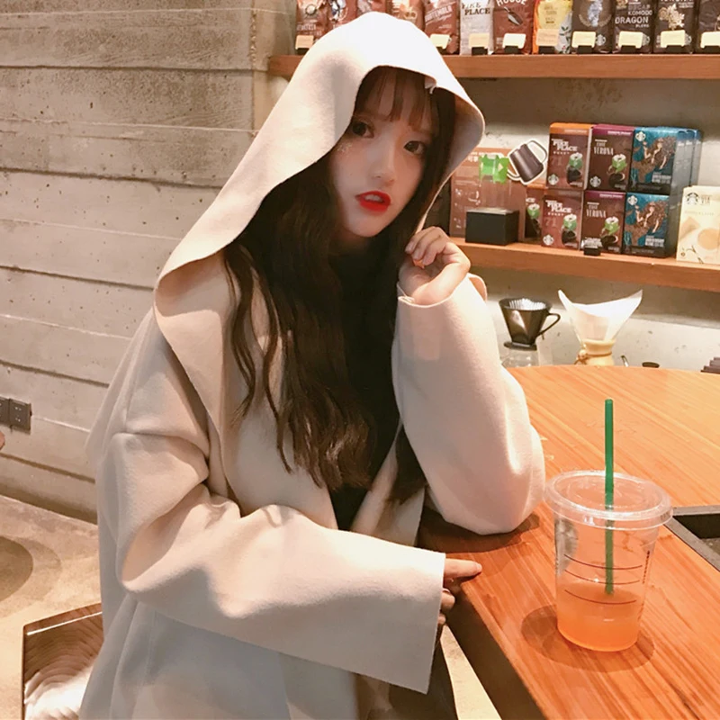 

Autumn and winter 2020 new Korean sweet temperament medium long loose long sleeve hooded woolen coat fashion