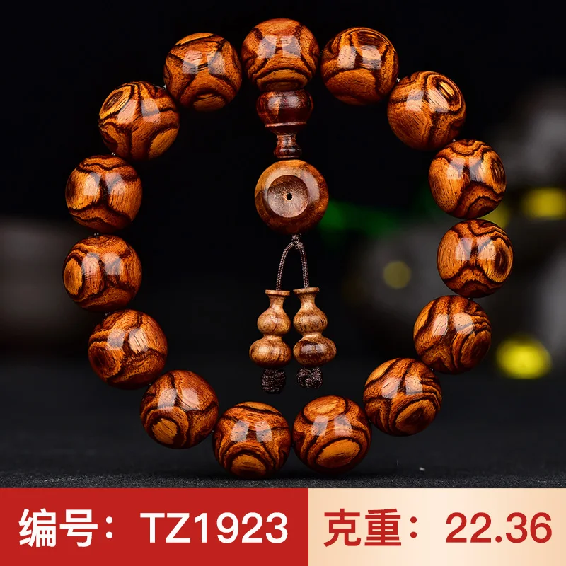 

Collection full of faces to ghost eyes x pattern 15 Hainan Huanghua pear hand string men and women's gold Buddha beads solitary