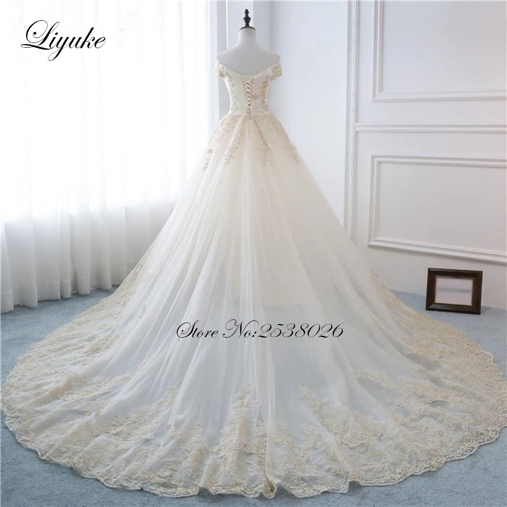 Liyuke Customize Made Champagne Lace Of A Line Wedding Dress Strapless Bride Dress Court Train