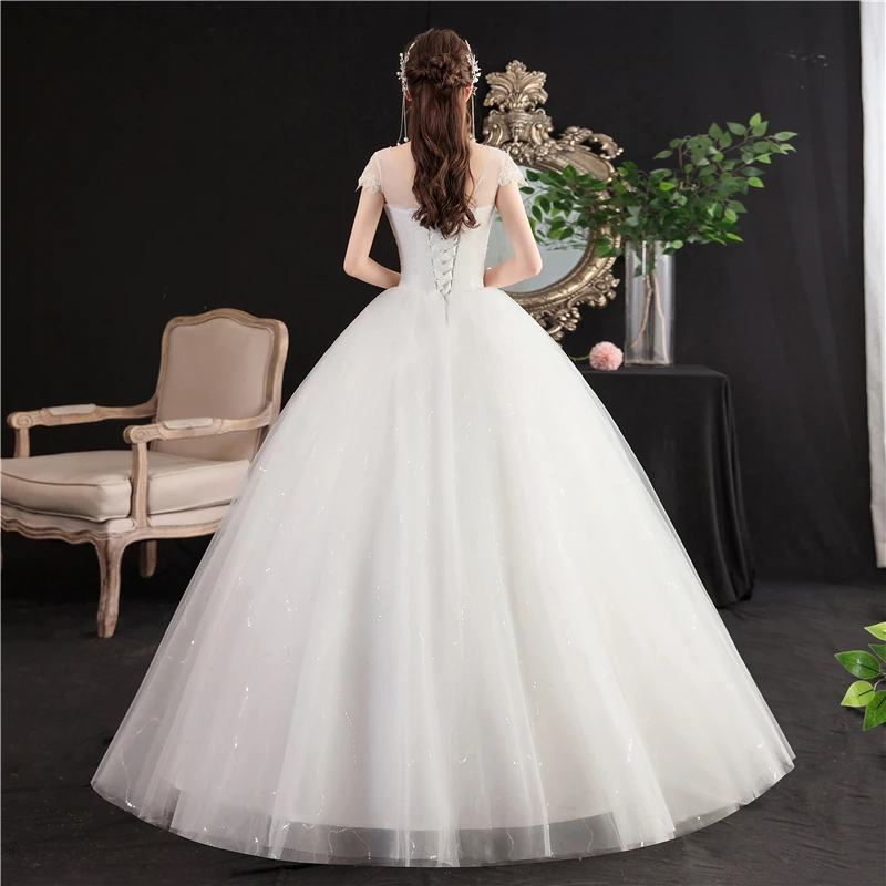 Nowy Vestidos de Novia tanie ślubna sukienka z rękawami Cap Sleeve koronkowe aplikacje Vintage kulka suknia haft księżniczka Plus rozmiar suknia ślubna