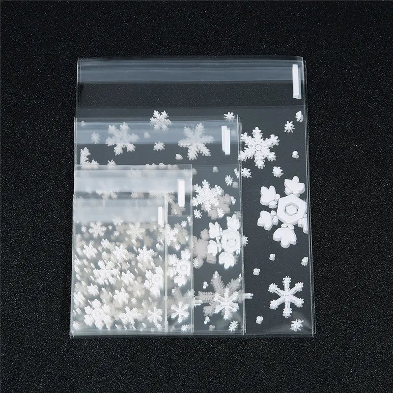 100pcs/lot Merry Christmas Transparent Snowflake Gift Bags Cello Bag Self-adhesive Cookie Bags for Holidays Party Gift Packaging