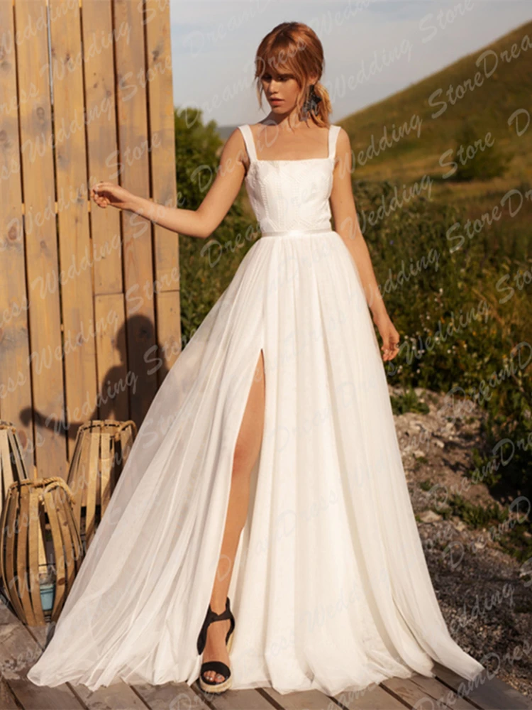 Abito da sposa da spiaggia personalizzato A Line 2025 per la sposa scollo a barca senza maniche senza schienale Sweep Train Robe De Soirée De Mariage