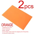 2 piezas de color naranja