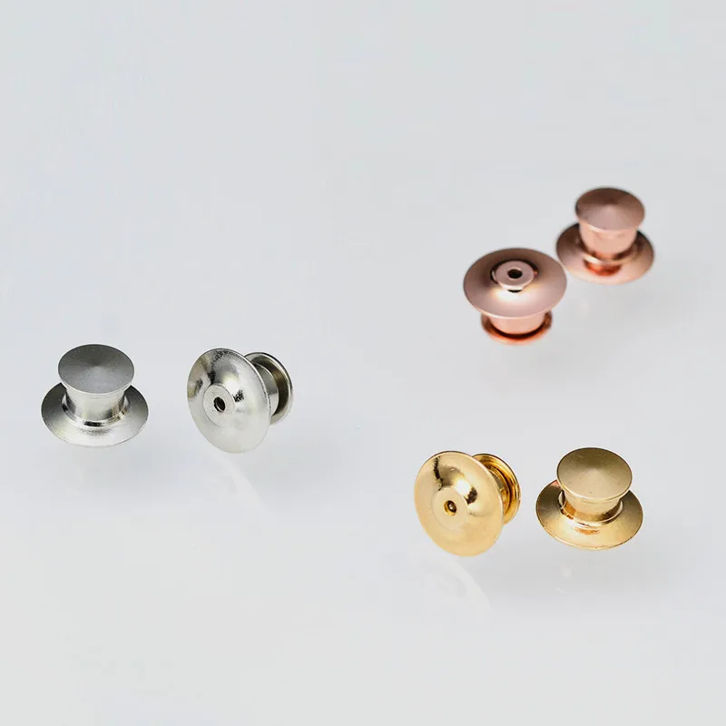 10/20/50/100 sztuk/zestaw metalowa broszka Pin tylne blokujące Keepers bezpieczne blokowanie sprzęgła Deluxe Pin BacK odznaka wisiorki dla DIY biżuteria