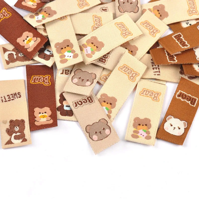 50Pcs Lovely Brown Bear Embroidery Labels For Sewing Accessories Bags Clothes Washable Care Tags Kids Garment Handmade DIY c3205