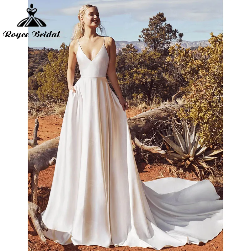 Simple A Line Wedding Dresses with Pockets Satin Pearls V Neck Backless Spaghetti Straps Sweep Train Robe de mariee Roycebridal