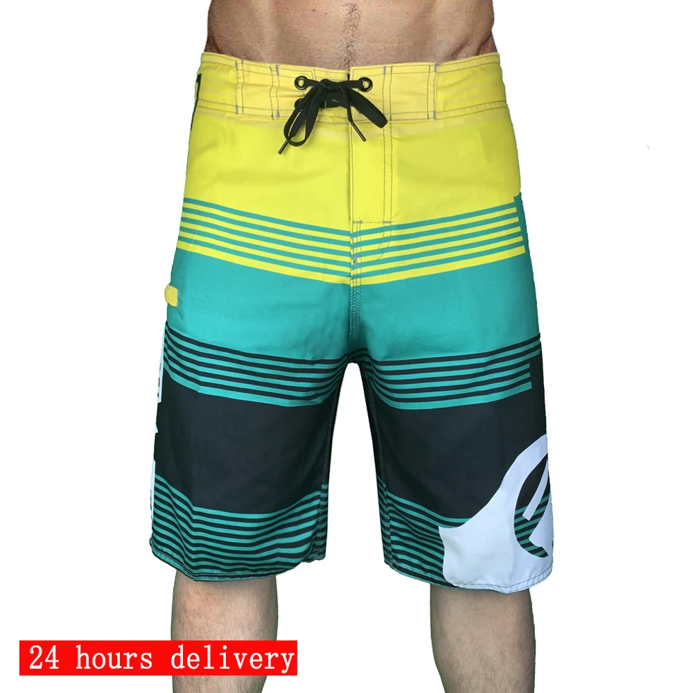 2024 new men's surf beach pants water sports casual pants running fitness pants five-point slant pants swimming pants swimsuit