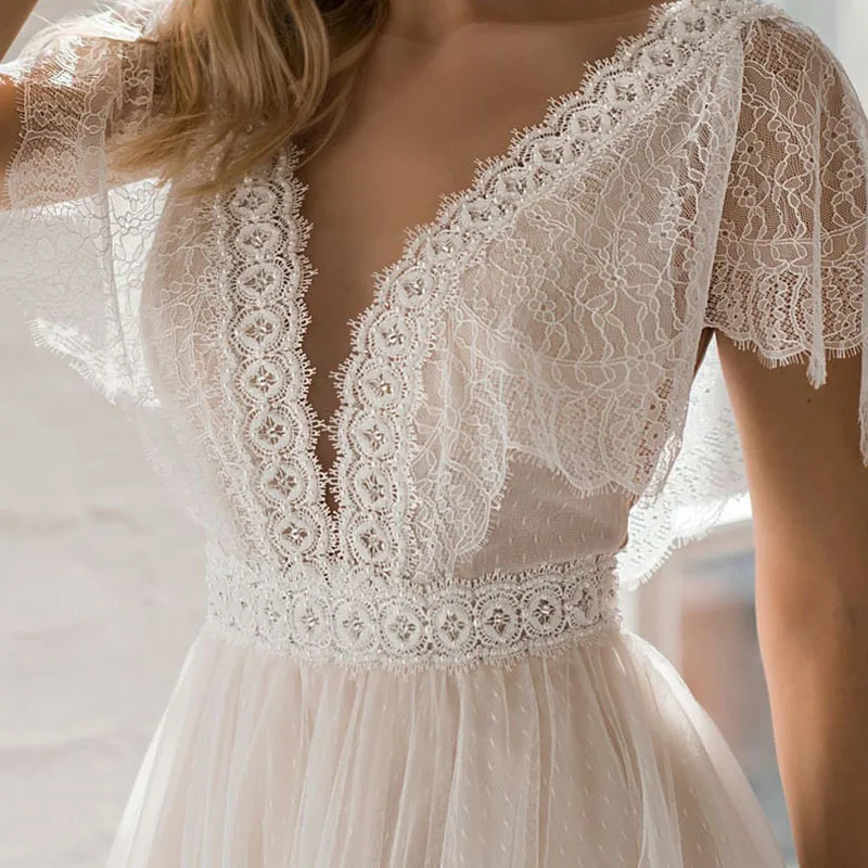 Robe de mariée en dentelle avec col en V profond, tulle à pois, sur mesure, manches courtes flottantes, coupe basse, dos nu, plage, robe de patients princesse Boho