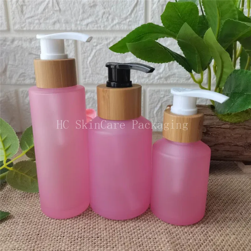 

Sample Free Pink frosted Glass Bottle White/Black Pump Bamboo Cap,Cosmetic Packing,Cosmetic Bottle,Packing For Liquid