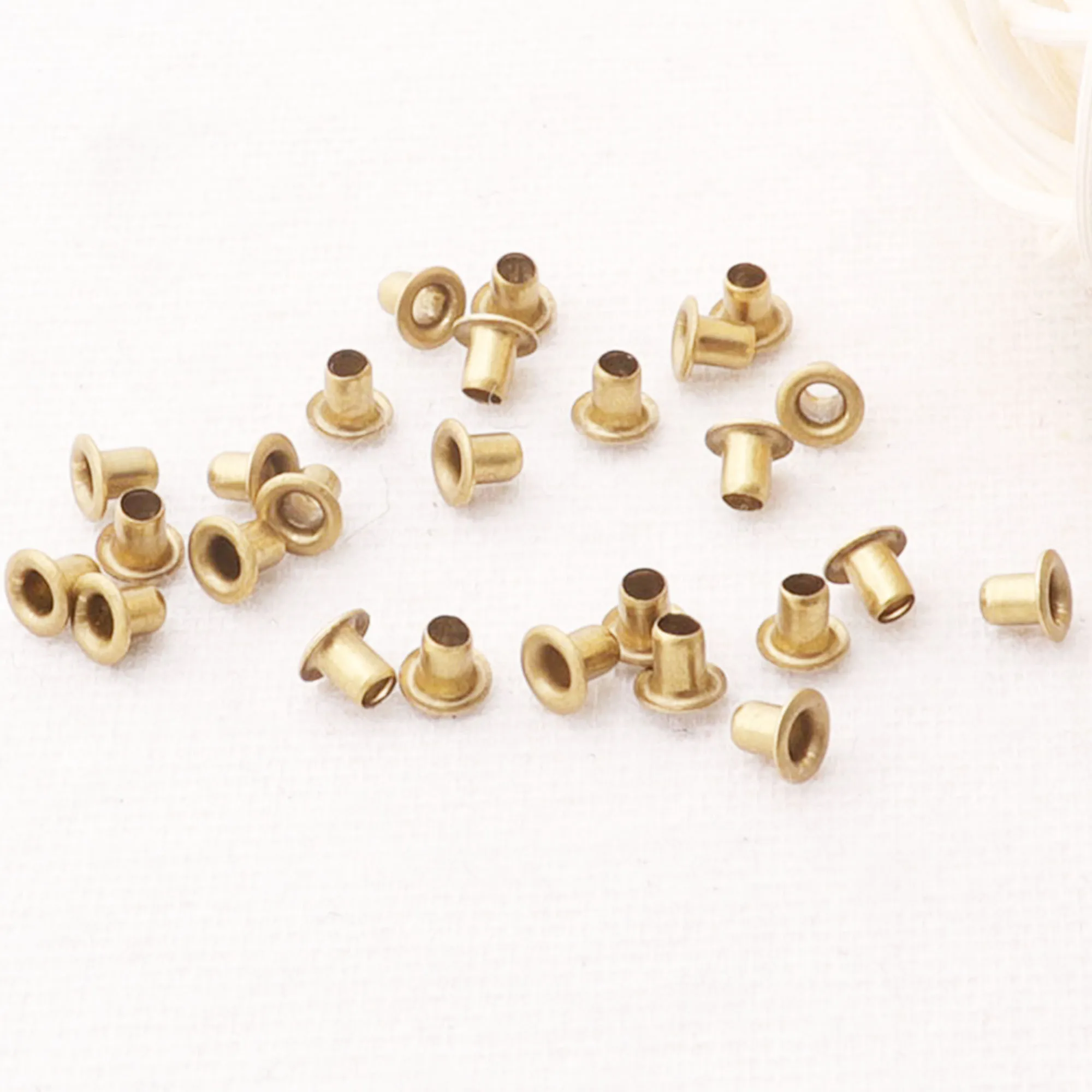 100 pcs Bronze MINI eyelets 1/16\