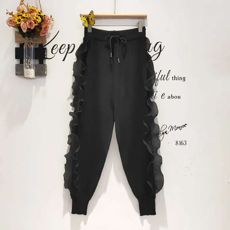 Pantalones bombachos negros a la moda para Mujer, pantalón de chándal holgado de estilo coreano Harajuku con parche de volantes, informal, de