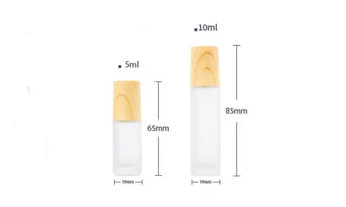 Frosted Clear Glass Roller Bottles Containers With Metal Roller Ball And Wood Grain Plastic Cap For Essential Oil Perfume