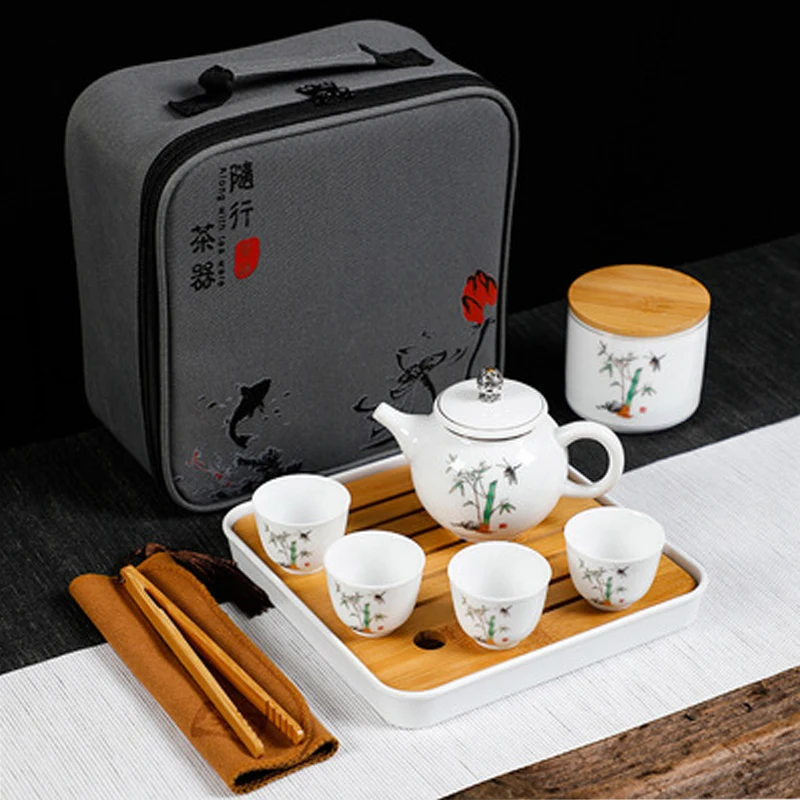 

High-end Gift Tea Set Set China Travel Tea Set Portable Ceramic Teapot Tea Cup One Pot Four Cups Chinese Tea Ceremony Tools
